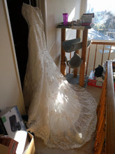 Load image into Gallery viewer, Allure Bridals &#39;2712&#39; size 6 used wedding dress back view on hanger
