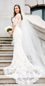 Amsale 'Nicole' size 4 used wedding dress side view on bride