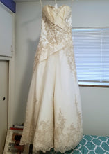 Load image into Gallery viewer, Maggie Sottero &#39;Strapless&#39; size 4 used wedding dress front view on hanger
