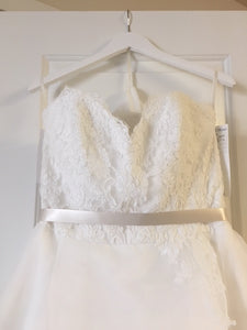 Paloma Blanca '4610' size 10 new wedding dress front view close up on hanger