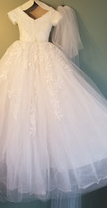Custom 'Classic' size 2 used wedding dress back view on hanger