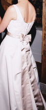 Load image into Gallery viewer, Custom &#39;Classic&#39; size 8 used wedding dress back view on bride
