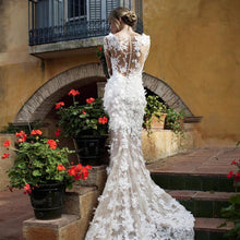 Load image into Gallery viewer, Pronovias &#39;Capricornio&#39; size 6 sample wedding dress back view on model
