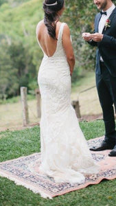 Sottero and Midgley 'Tatum' size 6 new wedding dress back view on bride