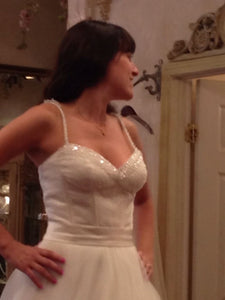 Rina Di Montella 'Beaded Corset' size 4 sample wedding dress front view close up on bride