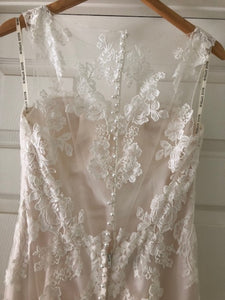 Maggie Sottero 'Jovi' size 8 used wedding dress back view on hanger