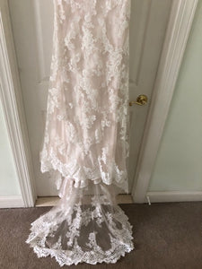 Maggie Sottero 'Jovi' size 8 used wedding dress front view on hem