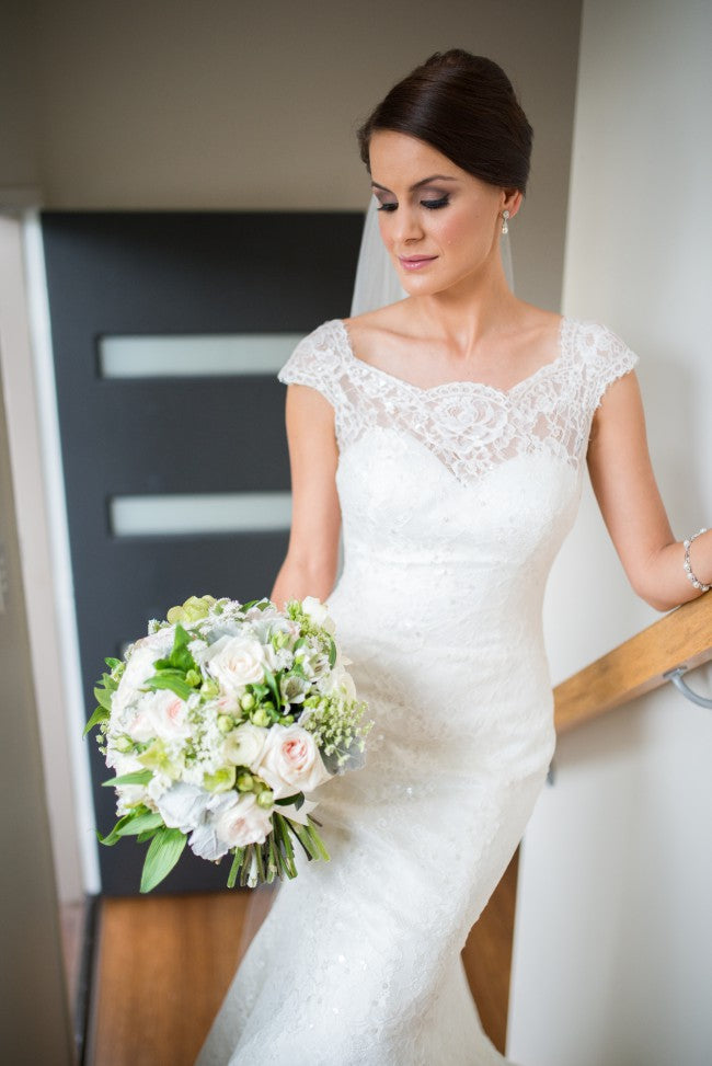 Augusta Jones 'Skylar' size 4 used wedding dress front view on bride