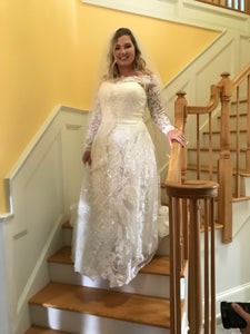 Oleg Cassini 'Off Shoulder Lace' size 14 used wedding dress front view on bride