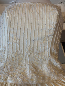 Custom 'Diamond Collection' size 8 used wedding dress close up of fabric