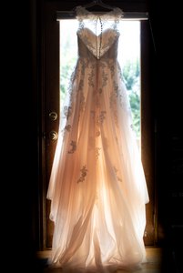 StellaYork 'Lace Illusion Back' size 6 used wedding dress back view on hanger