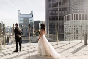 Watters 'Hearst' size 6 used wedding dress side view on bride