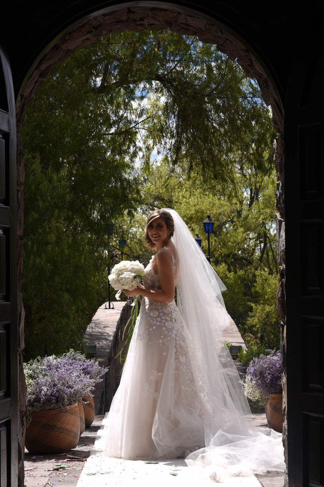 Mira Zwillinger 'Julie' size 6 new wedding dress side view on bride