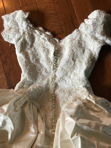 Custom 'Stunning' size 6 used wedding dress back view flat