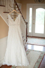 Load image into Gallery viewer, Allure Bridals &#39;Floral Lace&#39; size 14 used wedding dress front view on hanger
