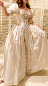 Custom 'Romantic' size 4 used wedding dress side view on bride