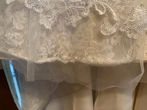 David's Bridal 'Jewel WG3755' size 00 used wedding dress front view of hemline