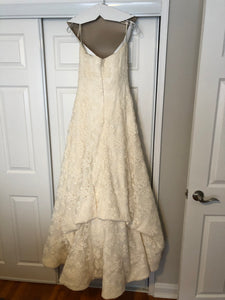 Vera Wang 'Ivory Strapless' size 12 used wedding dress back view on hanger