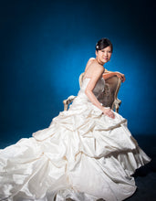 Load image into Gallery viewer, Maggie Sottero &#39;Calista&#39; size 8 used wedding dress side view on model
