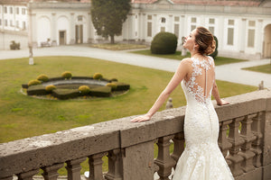 Eddy K '1078' size 8 used wedding dress back view on model