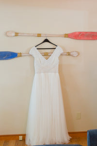 Theia 'Nima' size 12 used wedding dress back view on hanger