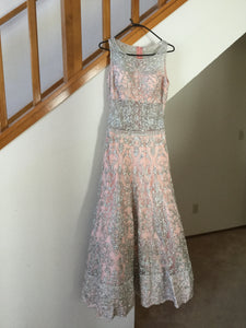 Custom 'Cinderella' size 4 used wedding dress front view on hanger