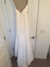 Load image into Gallery viewer, Demetrios &#39;1443&#39; size 4 used wedding dress back view on hanger
