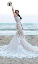 Load image into Gallery viewer, Calle Blanche &#39;Lydia&#39; size 8 used wedding dress side view on bride
