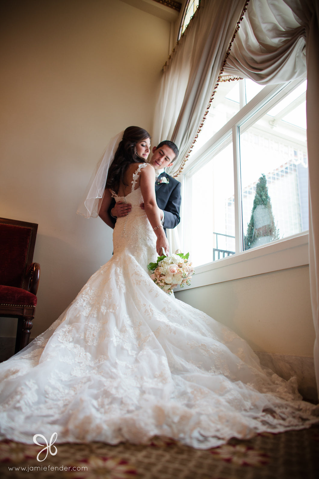 Enzoani 'Diana' size 2 used wedding dress back view on bride