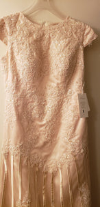 Custom 'Column Lace' size 16 new wedding dress back view on hanger