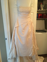 Load image into Gallery viewer, Maggie Sottero &#39;Strapless Beaded&#39; size 14 used wedding dress front view on hanger
