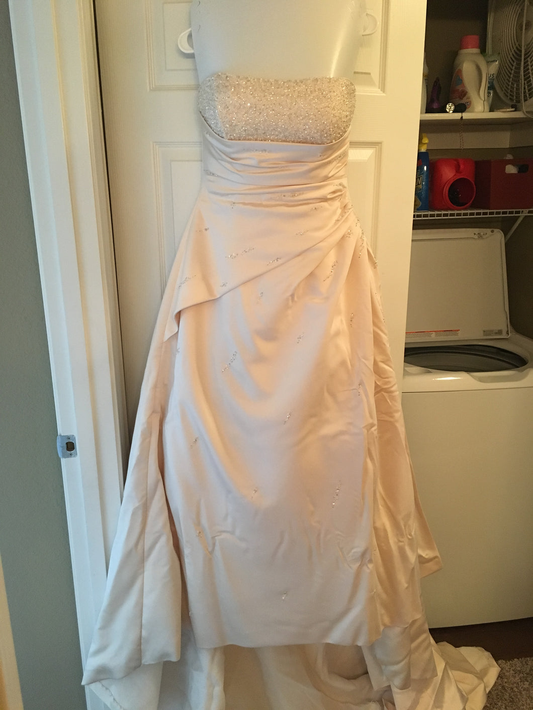 Maggie Sottero 'Strapless Beaded' size 14 used wedding dress front view on hanger