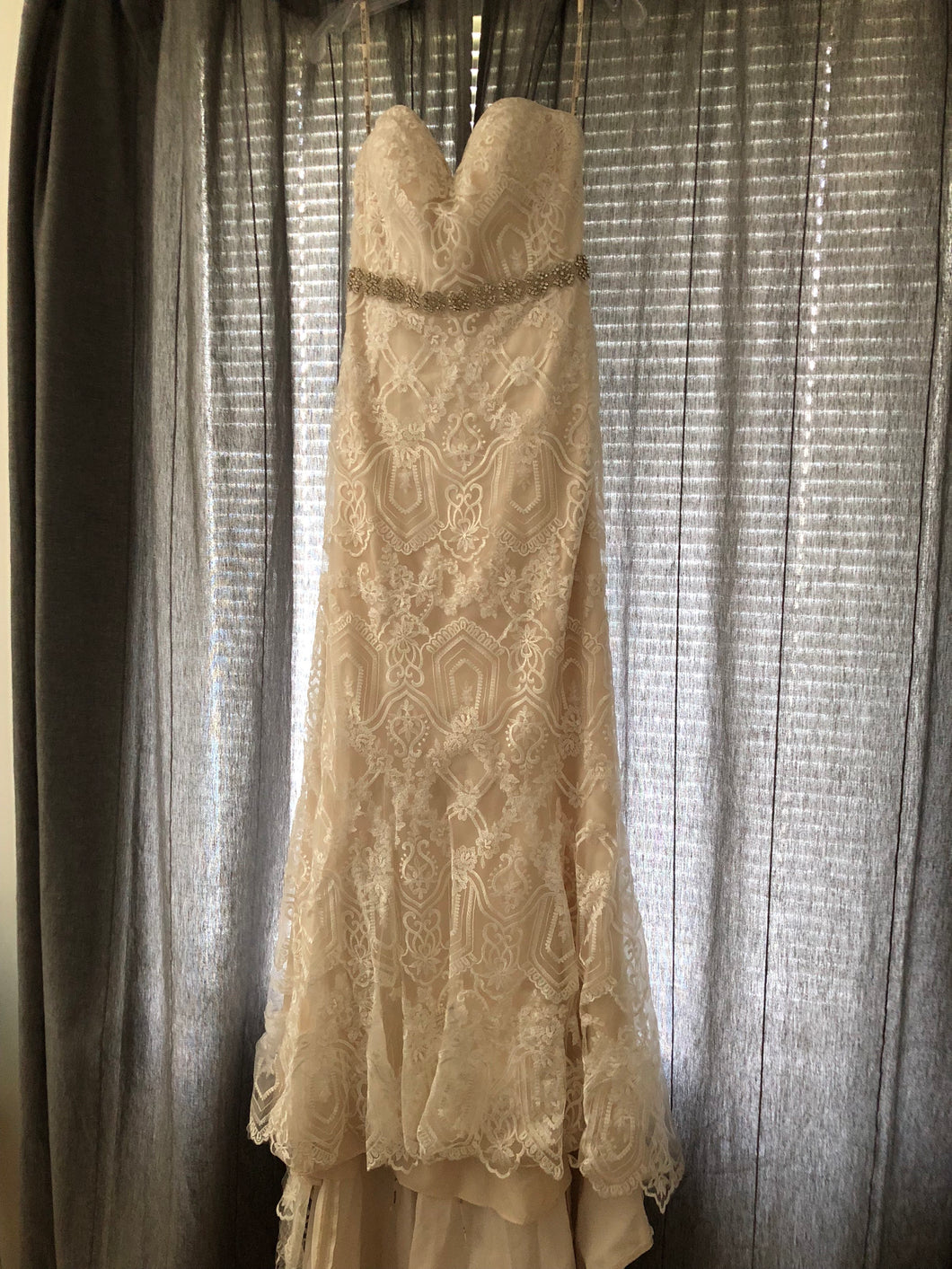 Maggie Sottero 'Fredericka' size 8 new wedding dress front view on hanger