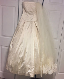 Judd Waddell 'Strapless' size 8 used wedding dress front view on hanger
