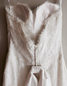 Modern Trousseau 'Beaded Dove' size 6 new wedding dress back view close up on hanger