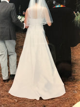 Load image into Gallery viewer, Wearkstatt &#39;Pleated&#39; size 8 used wedding dress back view on bride

