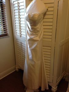 Nicole Miller 'Silk' size 4 used wedding dress front view on hanger