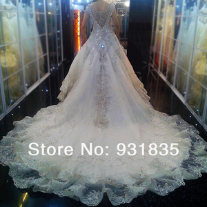 Custom 'Chellen' size 6 used wedding dress back view on model