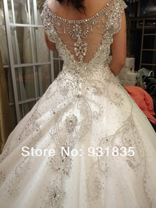 Custom 'Chellen' size 6 used wedding dress back view on model