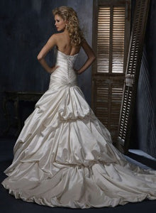 Maggie Sottero 'Kendra' size 8 used wedding dress back view on model