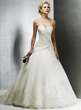 Load image into Gallery viewer, Maggie Sottero &#39;Strapless&#39; size 4 used wedding dress front view on model
