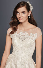 Load image into Gallery viewer, Oleg Cassini &#39;Illusion Cap Sleeve&#39; size 8 new wedding dress front view on model
