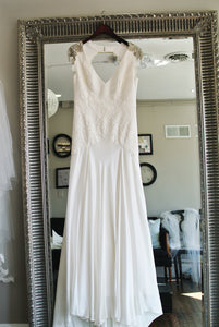 Carol Hannah 'Pemberley' size 12 sample wedding dress front view on hanger