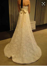 Load image into Gallery viewer, Vera Wang &#39;Ivory Lace Strapless A-Line&#39; size 4 used wedding dress back view on bride
