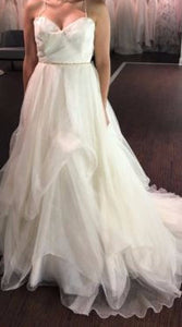 Rivini 'Custom' size 6 sample wedding dress front view on bride