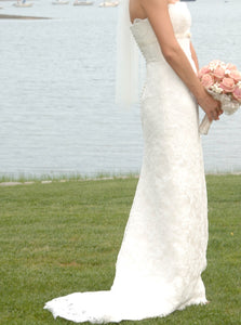 Stewart Parvin 'Spellbound' size 6 used wedding dress side view on bride
