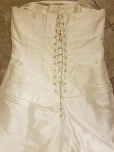 Cymbeline Paris 'Cymbeline' size 6 used wedding dress back view on hanger