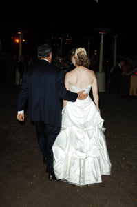 Custom 'Strapless Beaded' size 4 used wedding dress back view on bride