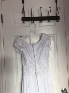 Bonny Bridal 'Sequin' size 4 used wedding dress back view on hanger