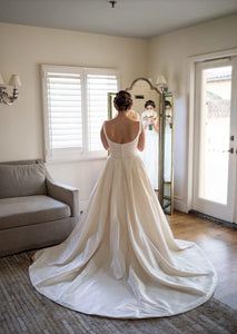 Madison James 'MJ05' size 8 used wedding dress back view on bride